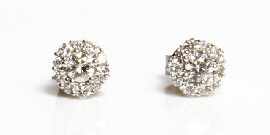 Appraisal: A pair of ct white gold diamond cluster earrings total