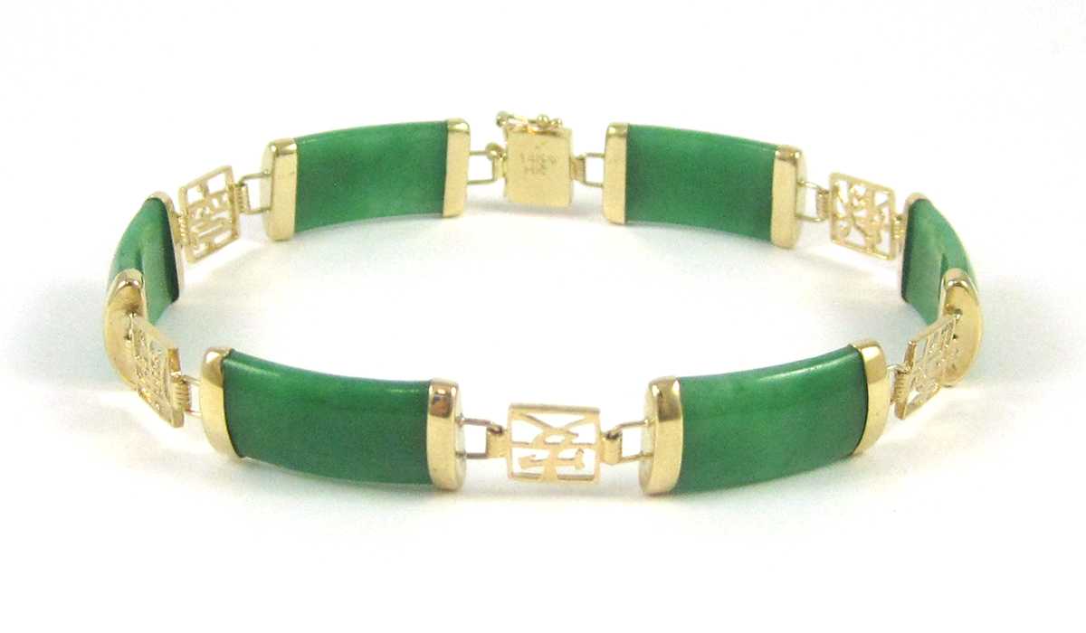 Appraisal: JADE AND FOURTEEN KARAT GOLD BRACELET measuring - inches in