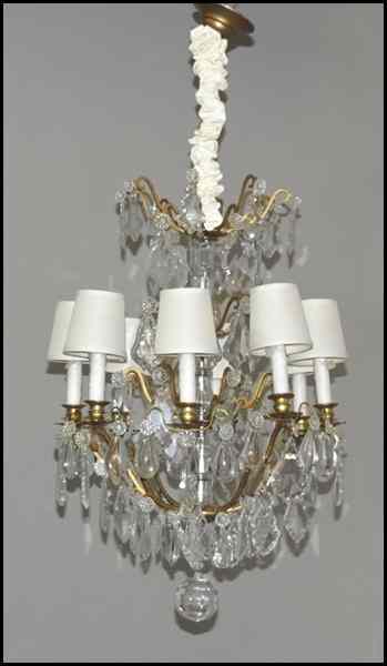 Appraisal: GILT BRONZE AND CRYSTAL EIGHT-LIGHT CHANDELIER Attributed to Baccarat ''