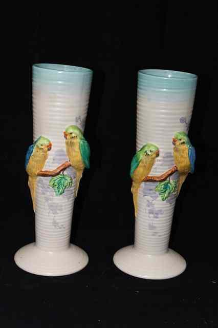 Appraisal: CLARICE CLIFF BRITISH - A pair of Budgerigar vases shape