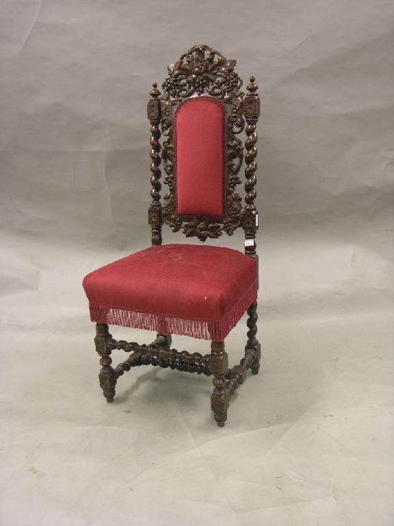 Appraisal: A late Victorian carved oak single chair upholstered in a