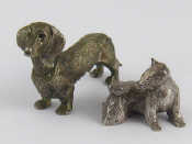 Appraisal: Two silver plated cast models a dachshund length cm and