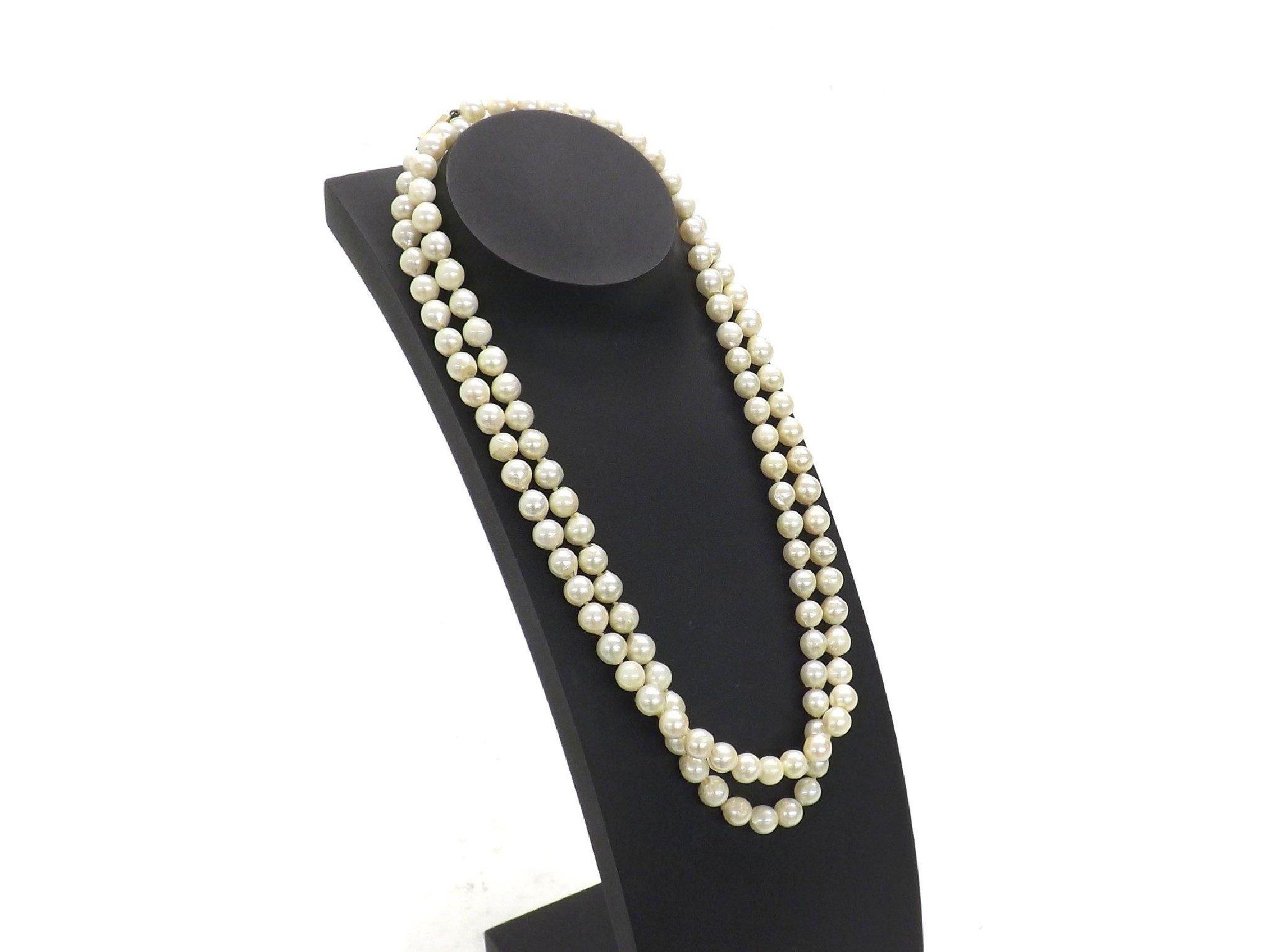 Appraisal: - -c Long single row of cultured pearls with a