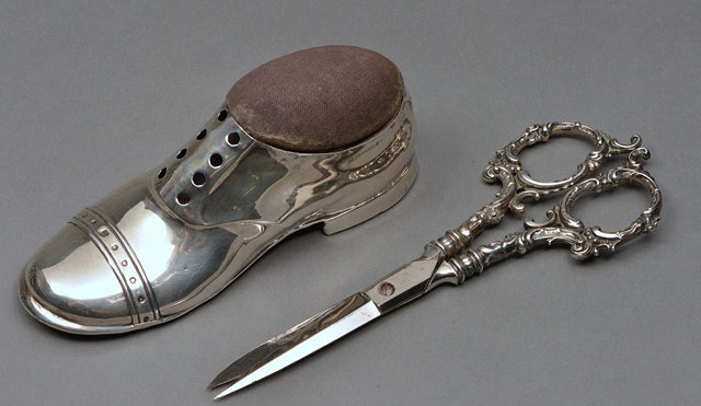 Appraisal: A SILVER PIN CUSHION in the form of a shoe