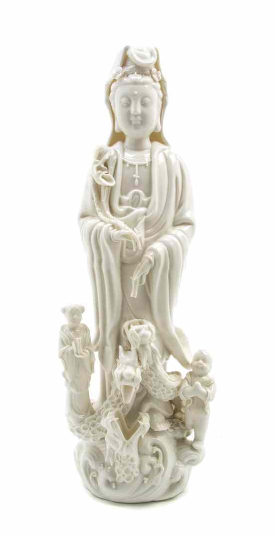 Appraisal: A Chinese Blanc de Chine Figure of Guanyin depicting a