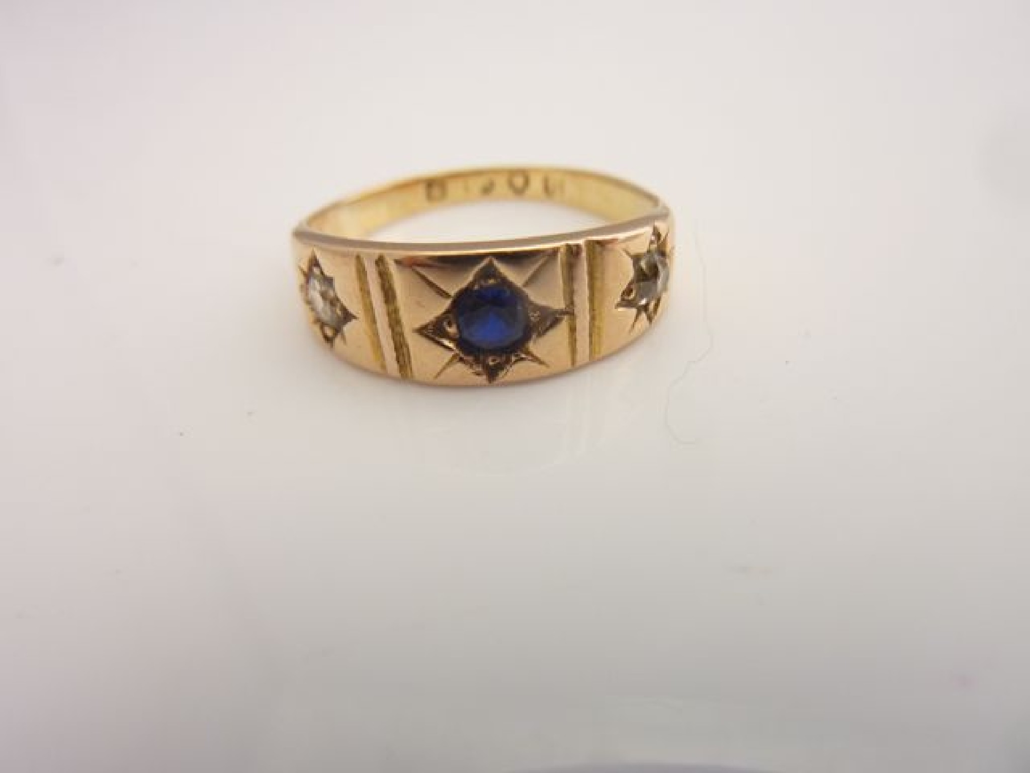 Appraisal: A Victorian sapphire and diamond ring centred with a round