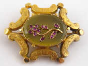 Appraisal: An antique tests carat gold chalcedony and ruby brooch with