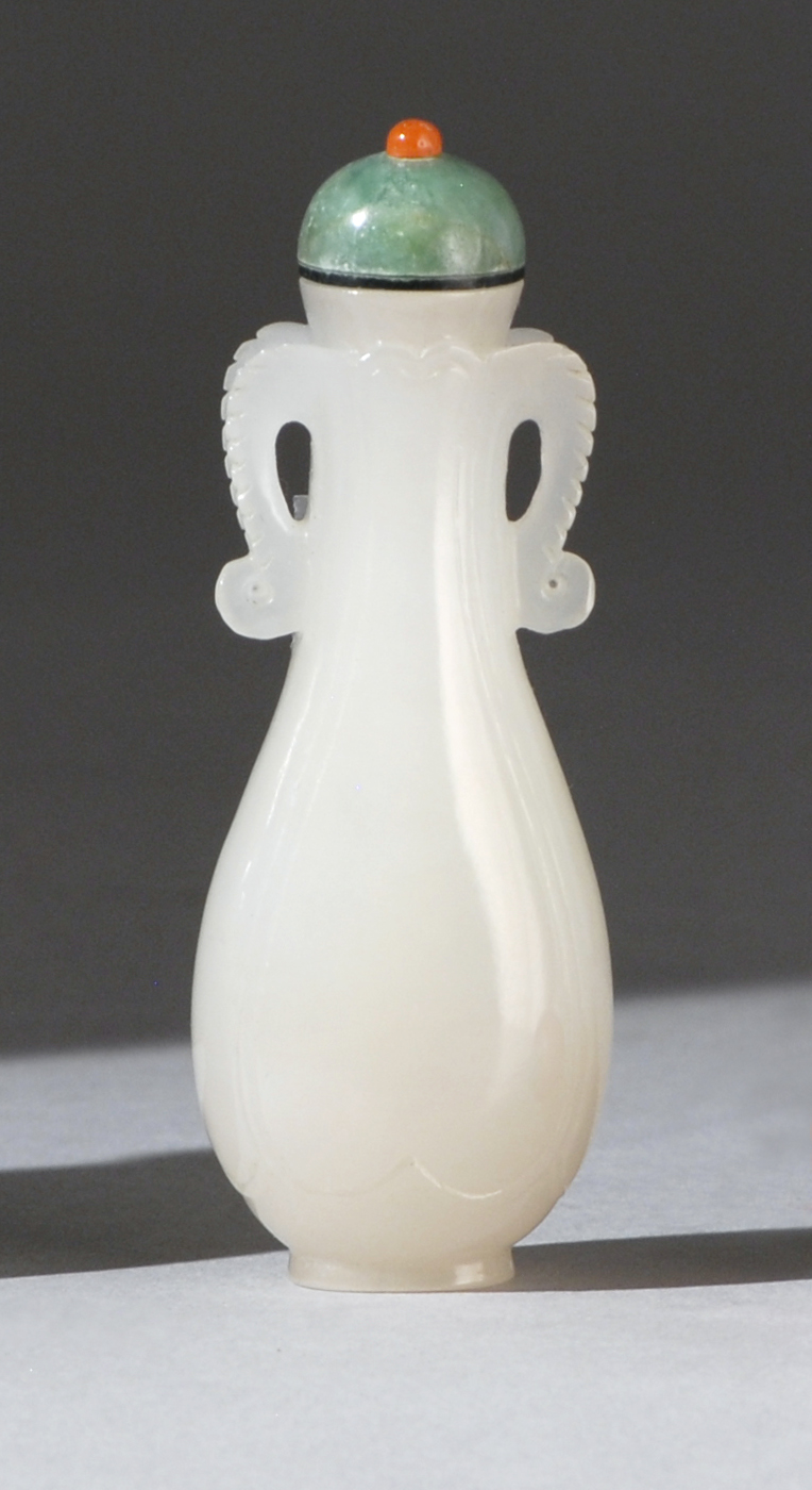 Appraisal: WHITE JADE SNUFF BOTTLE th CenturyIn vase form with leaf-form