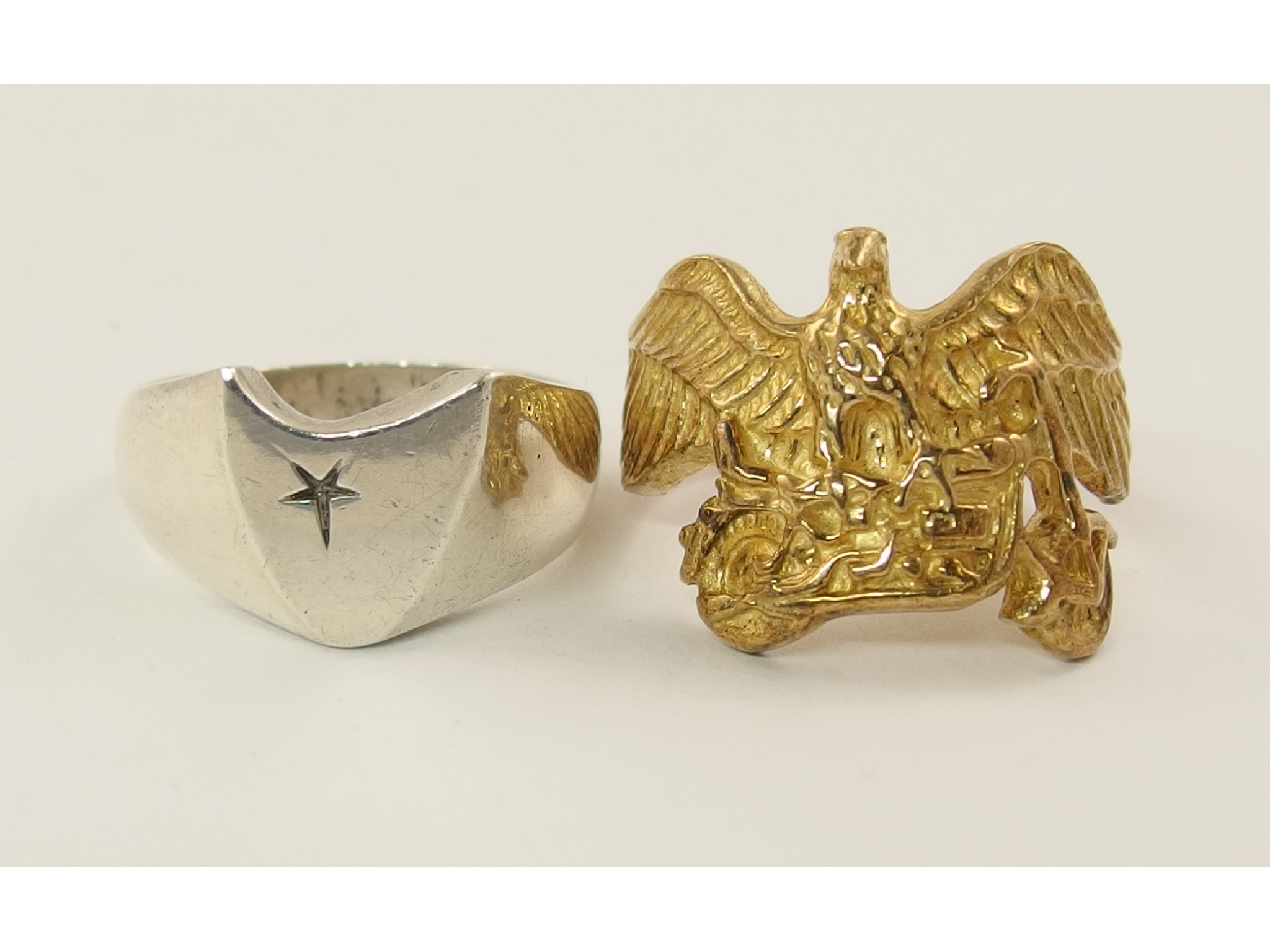 Appraisal: A ct gold eagle and motorbike biker ring together with