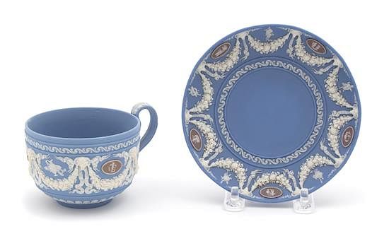 Appraisal: A Wedgwood Blue Basalt Cup and Saucer Diameter of saucer