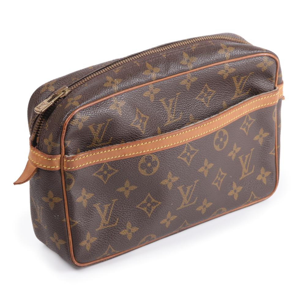 Appraisal: Louis Vuitton monogram canvas dopp kit makeup bag with leather