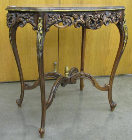 Appraisal: Ornately Carved French Walnut Side Table stretcher base with flame