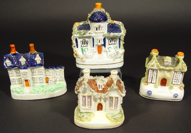 Appraisal: Four Victorian Staffordshire china houses one for money box use