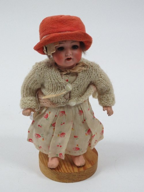 Appraisal: An Armand Marseille small bisque head doll the head impressed