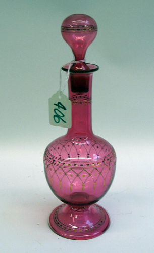 Appraisal: AN AMERICAN VICTORIAN CRANBERRY GLASS PERFUME BOTTLE having original stopper