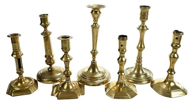 Appraisal: Seven Early Brass Candlesticks British Continental th th century two