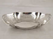 Appraisal: A shaped and pierced oval silver bowl by Richard Comyns