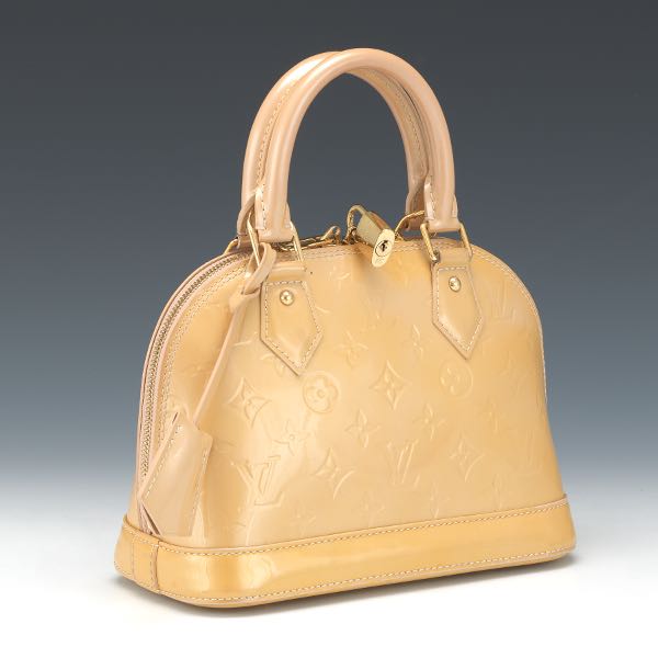 Appraisal: LOUIS VUITTON VERNIS ALMA BB x x Iconic body yellowish