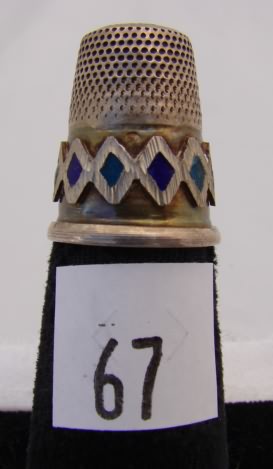 Appraisal: Silver thimble with green stone on top purple green stones