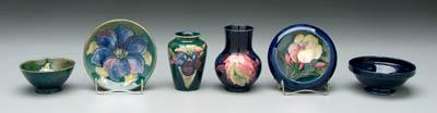 Appraisal: Six pieces Moorcroft pottery all with floral decoration two blue