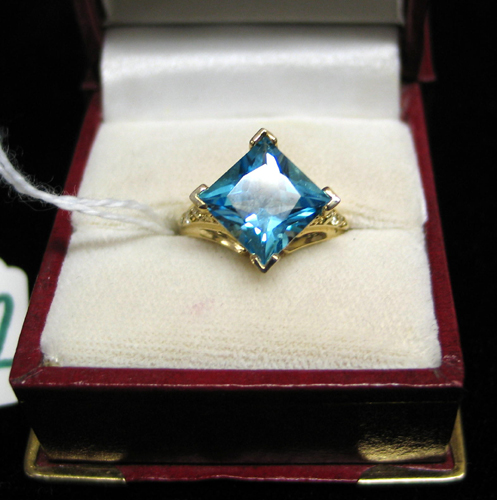 Appraisal: BLUE TOPAZ DIAMOND AND FOURTEEN KARAT GOLD RING Four prongs