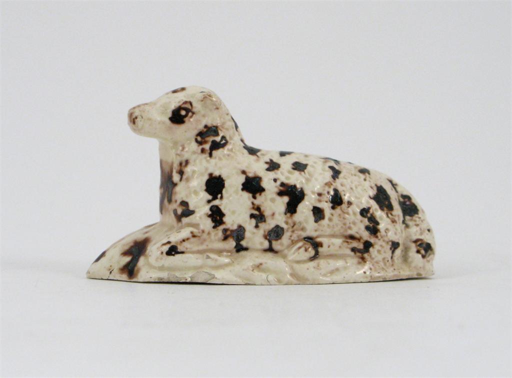 Appraisal: A small Pratt ware model of a recumbent sheep