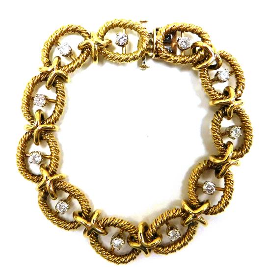 Appraisal: JEWELRY K yellow gold and diamond bracelet set with eleven