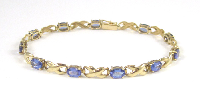 Appraisal: TANZANITE AND FOURTEEN KARAT GOLD BRACELET measuring - inches in