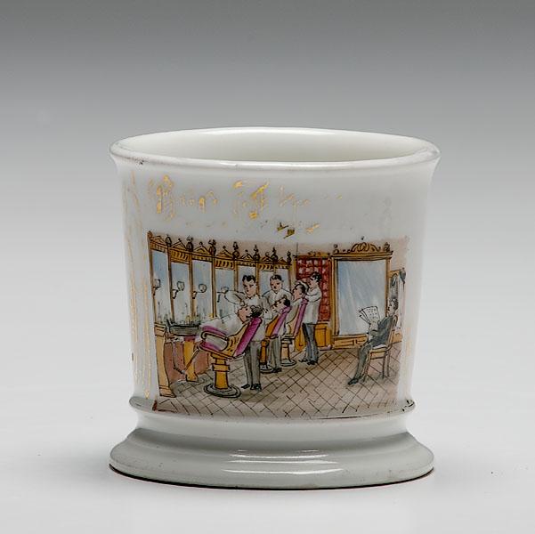 Appraisal: BARBER'S OCCUPATIONAL SHAVING MUG porcelain with polychrome painted scene of