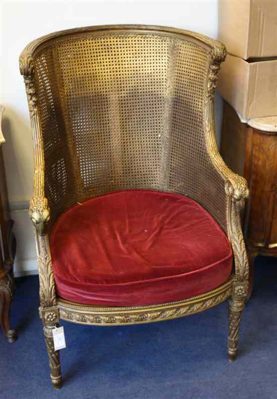 Appraisal: A Louis XVI design carved giltwood caned bergere chair the