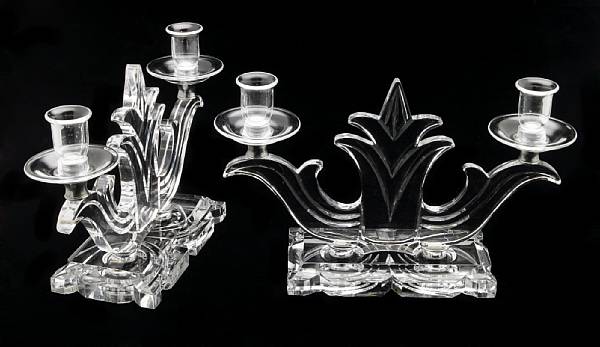 Appraisal: A pair of Steuben clear glass candelabra designed by James