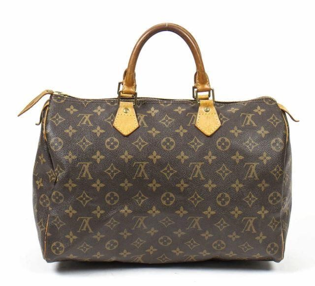 Appraisal: Louis Vuitton Speedy handbag in monogram coated canvas with brass