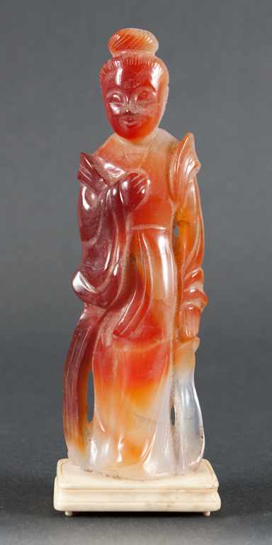 Appraisal: Chinese carved hardstone figure of Quanyin mounted on ivory base