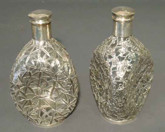 Appraisal: Two glass decanters with sterling silver overlay tricorne form h