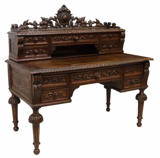 Appraisal: French Henri II style oak writing desk th c a