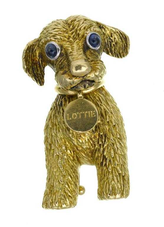 Appraisal: A CARTIER GOLD PUPPY BROOCH a disc on a collar