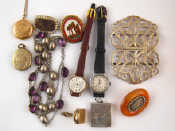 Appraisal: A mixed lot including a silver buckle two mourning brooches