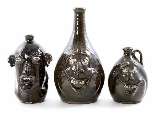 Appraisal: Southern pottery face jugs Crocker Brothers and Hewell Georgia alkaline