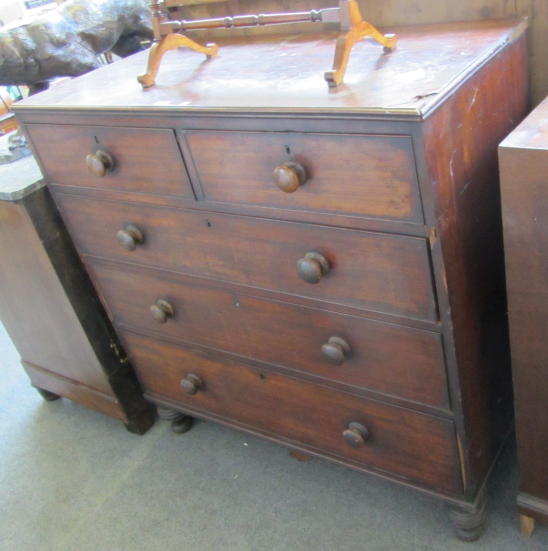 Appraisal: An early th century mahogany chest of two short and