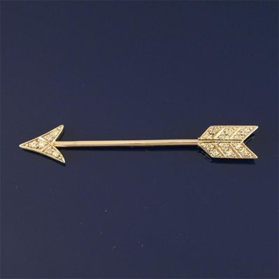 Appraisal: A diamond set white gold arrow form jabot pin