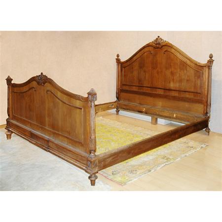 Appraisal: Louis XVI Style Walnut Bedstead Estimate -