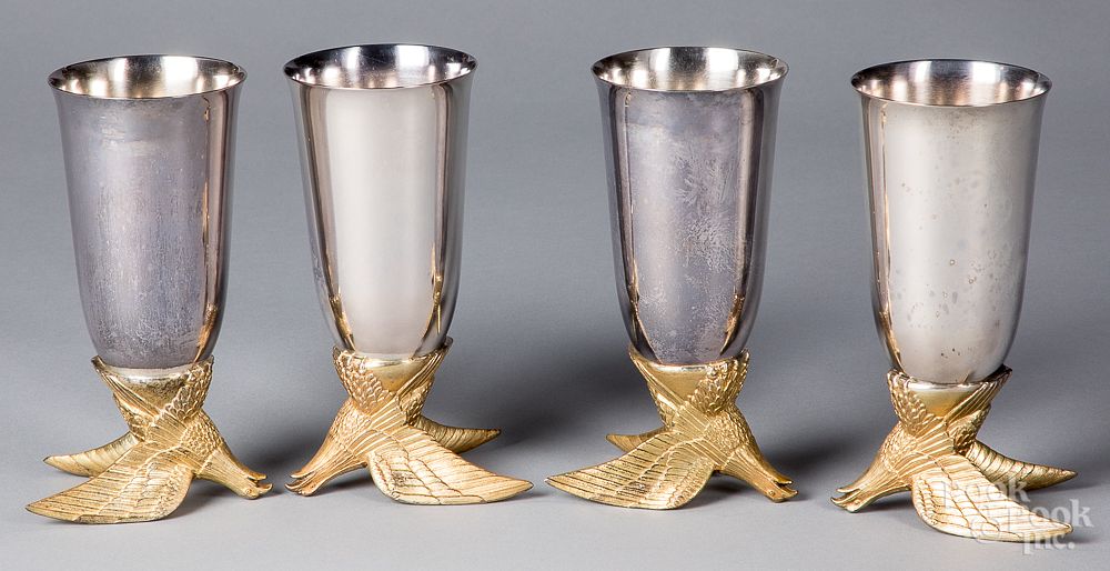 Appraisal: Four Anheuser Busch silver plated eagle cups Four Anheuser Busch