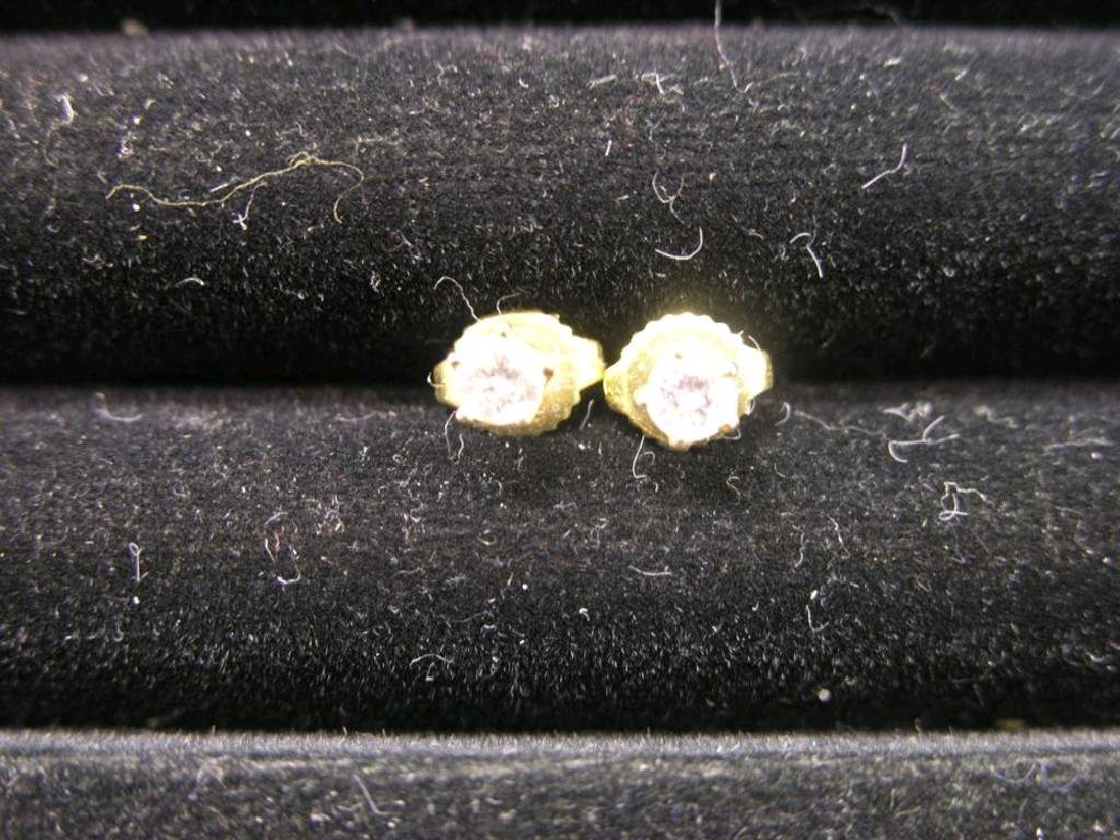 Appraisal: A pair of Russian diamond ear-studs cased