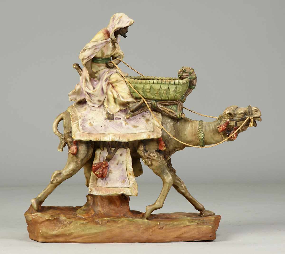 Appraisal: Amphora Bedouin Group C Arab seated on camel Impressed Austria