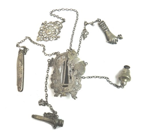 Appraisal: An Eastern chatelaine the top clip with pierced and engraved