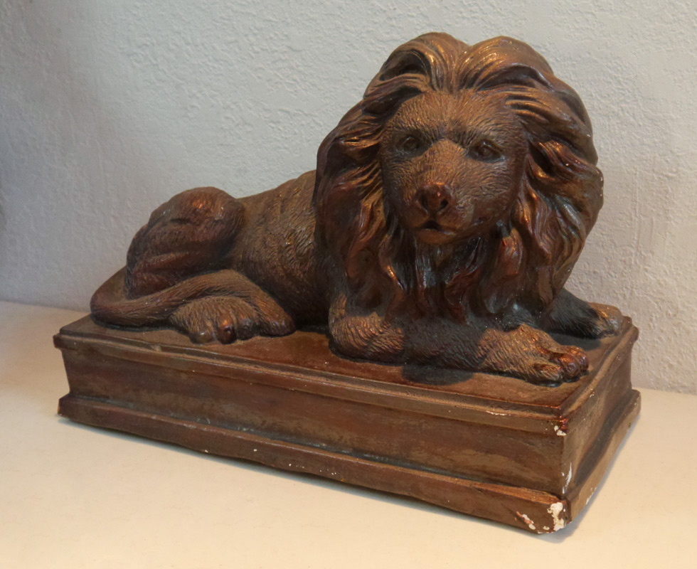 Appraisal: SEWER TILE FIGURAL LION Brown painted sewer tile form of