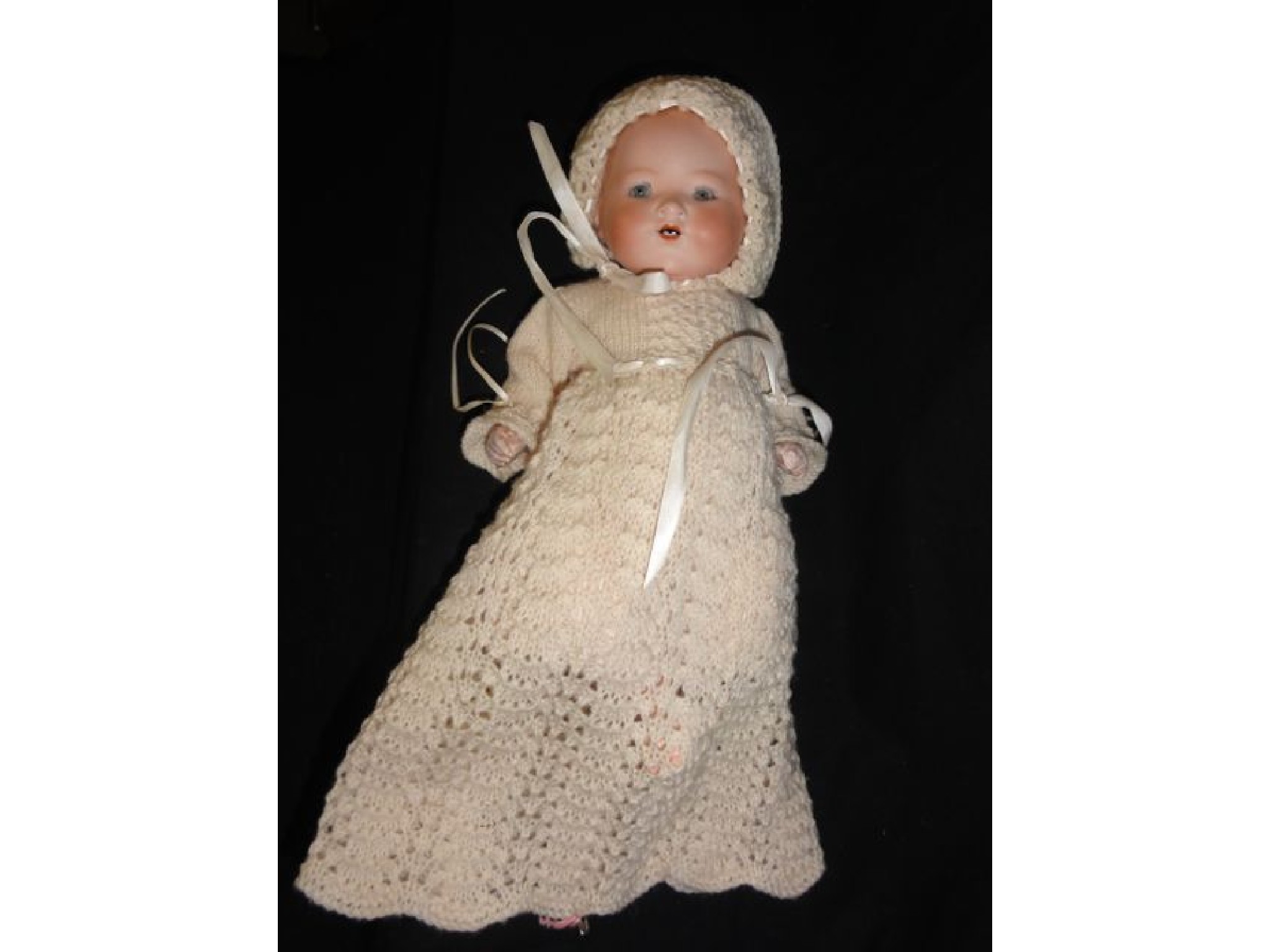 Appraisal: A late th early th century bisque headed doll by