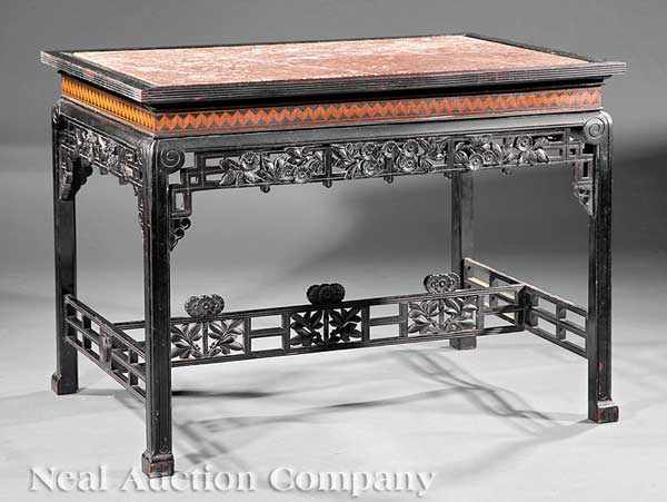 Appraisal: An American Aesthetic Carved Inlaid and Ebonized Center Table in