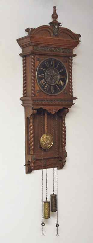 Appraisal: OAK CASE SATYR MOUNTED WALL CLOCK Oak case pediment with