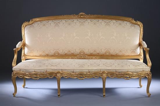 Appraisal: LOUIS XV STYLE GILTWOOD CANAPE late th century Shell-carved crest